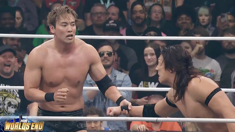 Okada and Takeshita in the ring