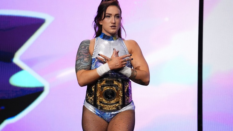 Kris Statlander makes her entrance with the AEW Women's World Championship.