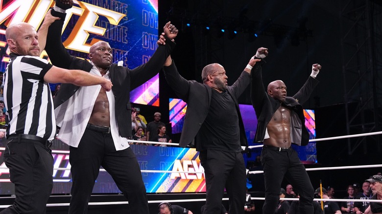 The Hurt Syndicate celebrate victory