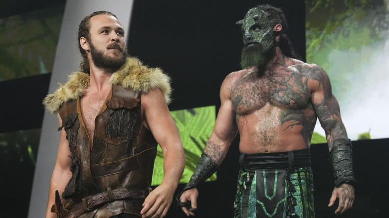 "Jungle" Jack Perry and Luchasaurus head down the ramp to the ring for their match at WrestleDream.