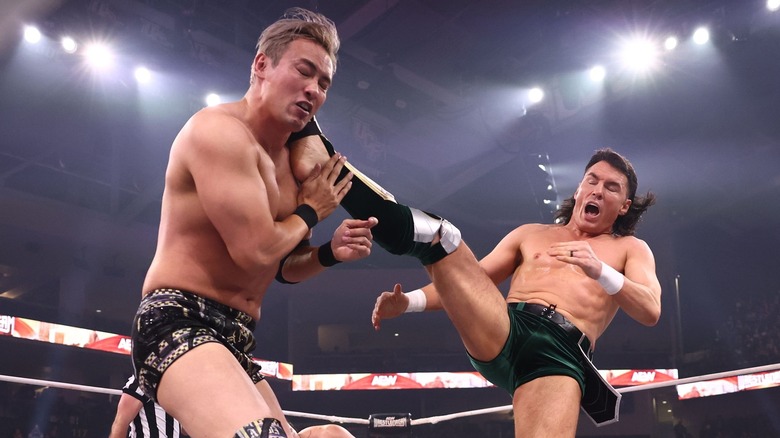 Speedball Mike Bailey kicks Kazuchika Okada in the face
