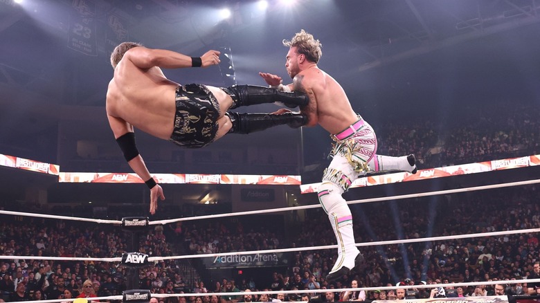 Kazuchika Okada dropkicks Will Ospreay