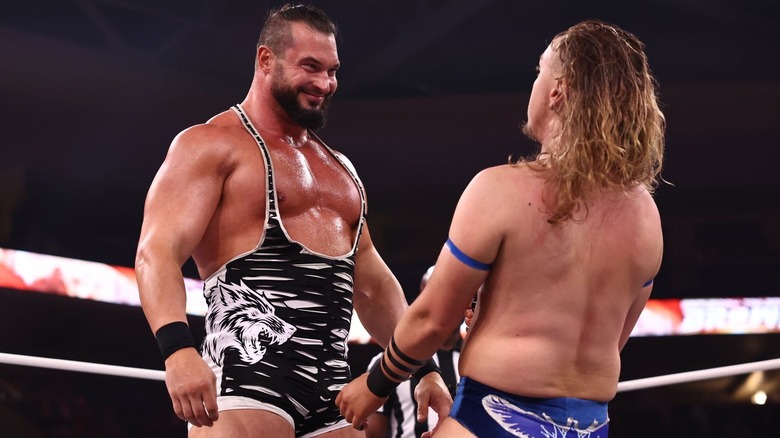 Wardlow smiles at a jobber in the ring on the AEW WrestleDream Tailgate Brawl