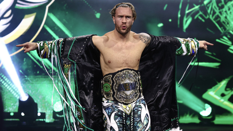 Ospreay on the entrance ramp with his AEW World Championship belt