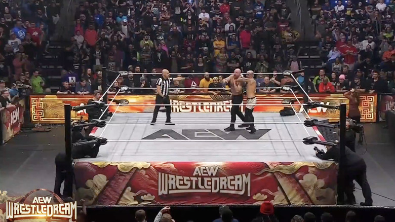 Moxley and Allin brawling in the ring