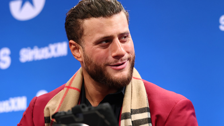 MJF showing off his hair
