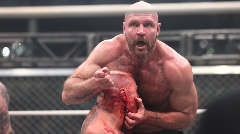 Jon Moxley mutilates Darby Allin's ear