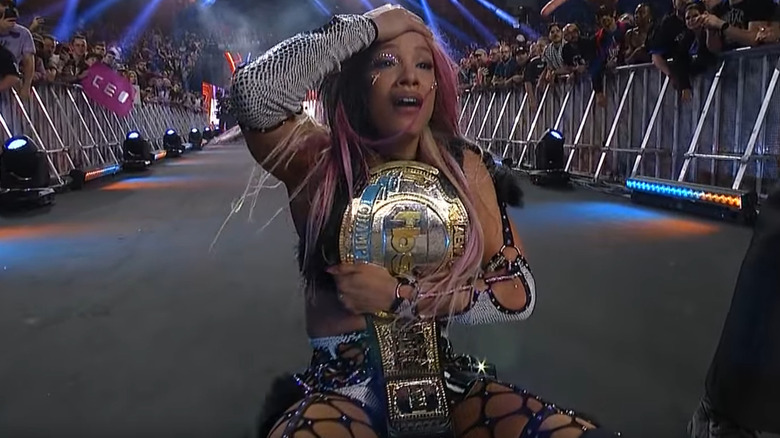 Mercedes Mone celebrating