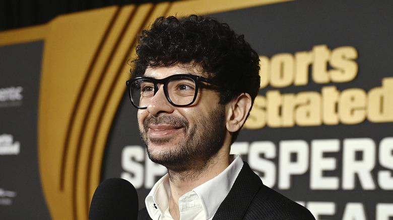 Tony Khan with a hot mic at a Sports Illustrated event