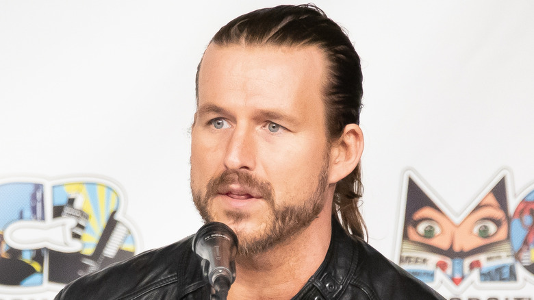 Adam Cole at a convention of the comic variety
