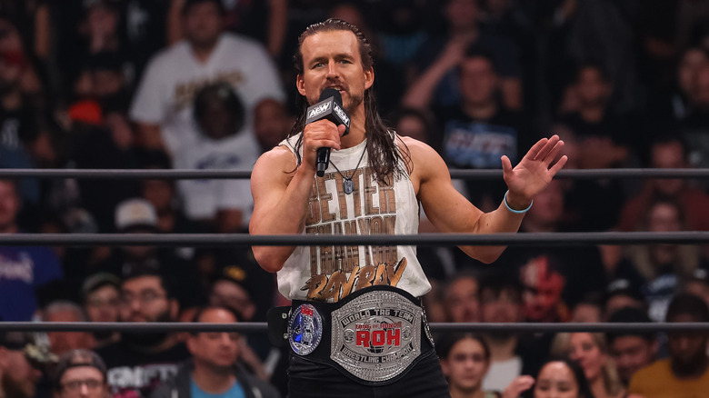 Adam Cole cutting a promo