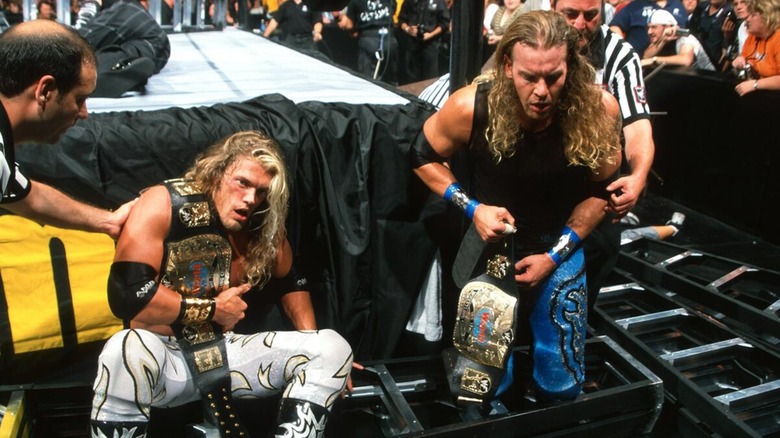 Edge (Adam Copeland) and Christian (Cage) after winning the WWE World Tag Team Championships match against The Hardy Boyz.