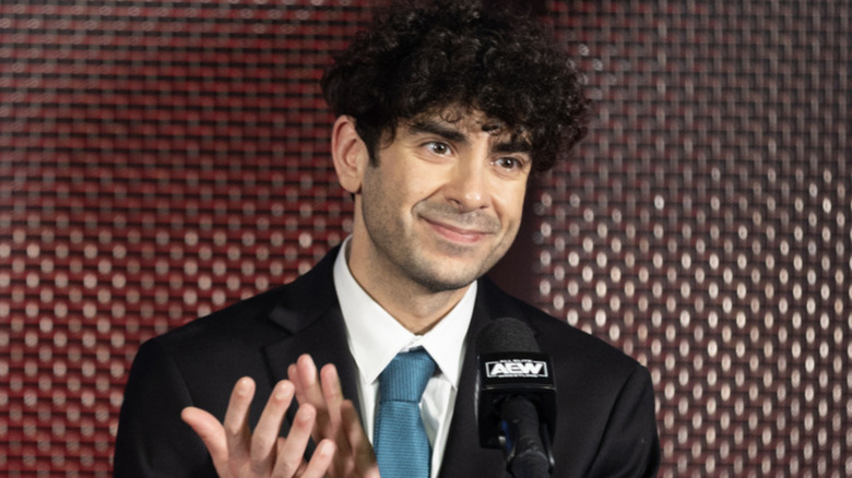 Tony Khan applauding