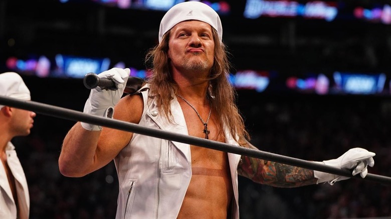 Chris Jericho grins on before his match on AEW