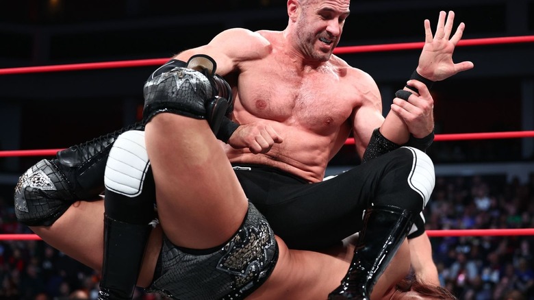 Claudio Castagnoli puts Konosuke Takeshita in a submission