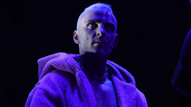 Darby Allin lit by blue lights