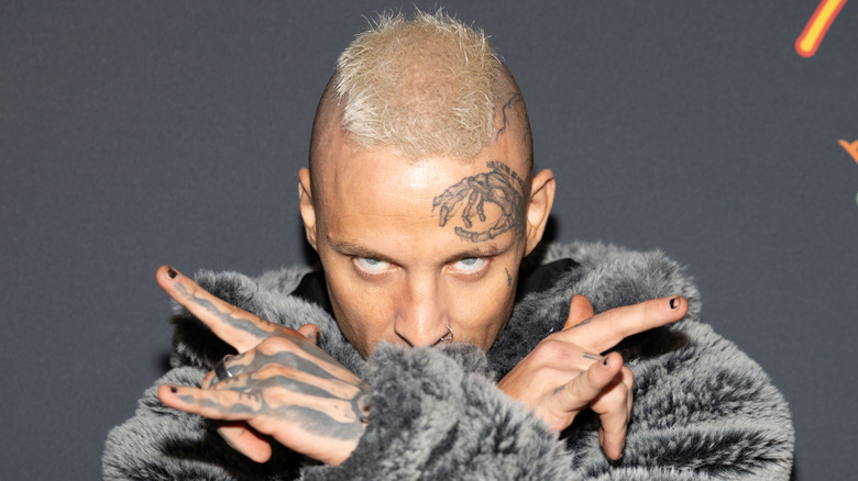 Darby Allin posing at a Super Bowl party