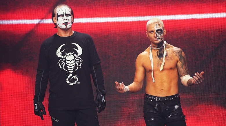 Sting and Darby Allin at the top of the ramp during a television segment on an AEW show.