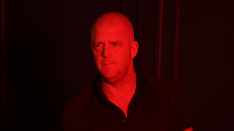 Dustin Rhodes under a red light