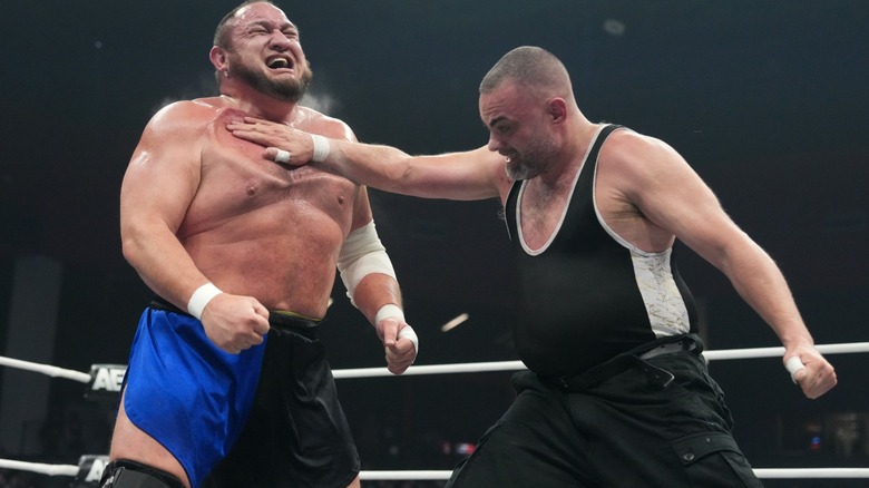 Eddie Kingston delivering his Machinegun Chops to Samoa Joe during their 