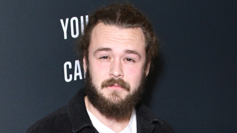 Jack Perry looking tired at a movie premiere