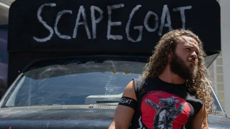 "Scapegoat" Jack Perry stands in front of his newly purchased bus ahead of the May 2024 AEW Double or Nothing pay-per-view event