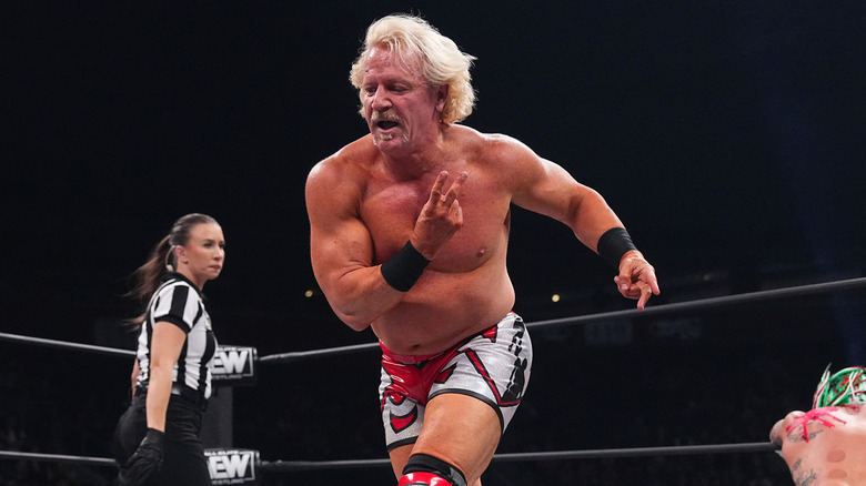Jeff Jarrett strutting in the ring 