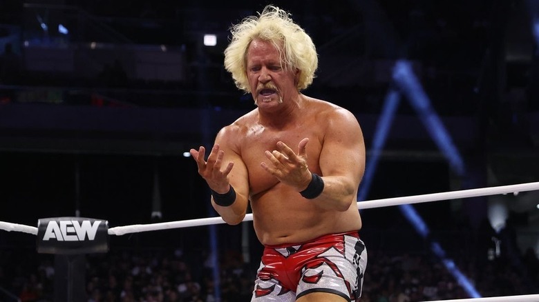 Jeff Jarrett taunting in ring during an AEW match.