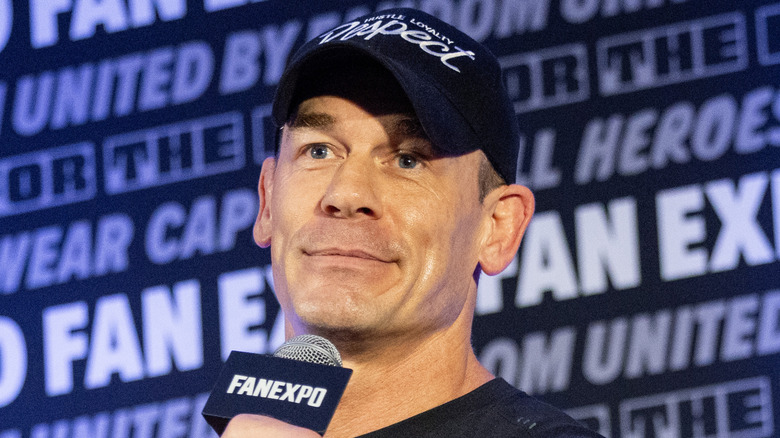 John Cena with a Hustle, Loyalty, and Respect hat