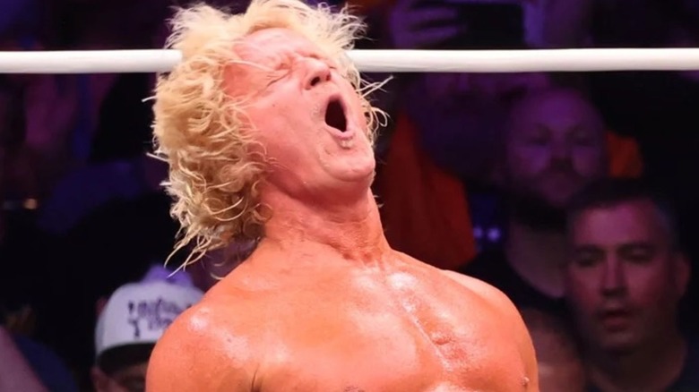 Jeff Jarrett "woos" emphatically in the ring.
