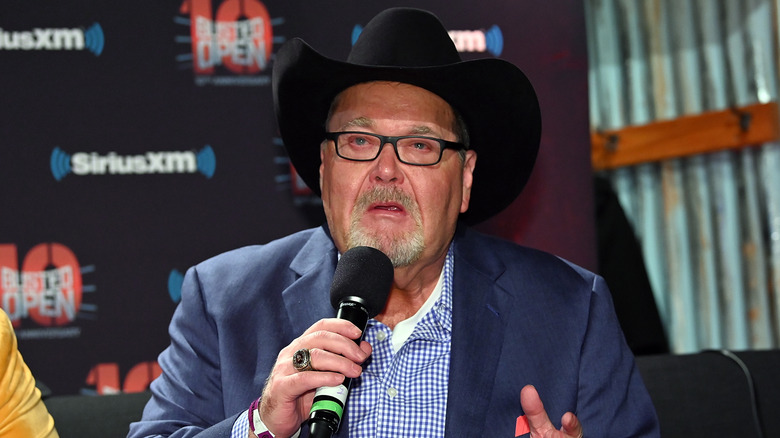 Jim Ross speaking into a mic