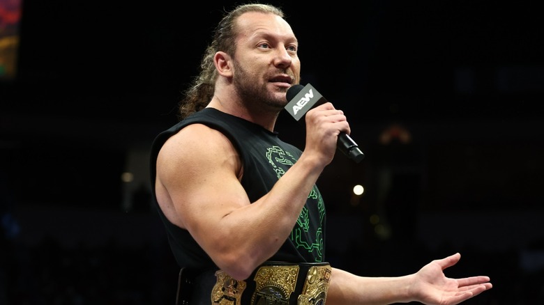 Kenny Omega addressing the fans during an episode of 