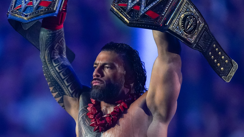 Roman Reigns with titles