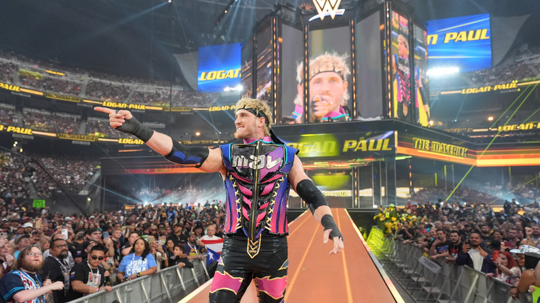 Logan Paul points out to the crowd as he makes his way out at WrestleMania 41