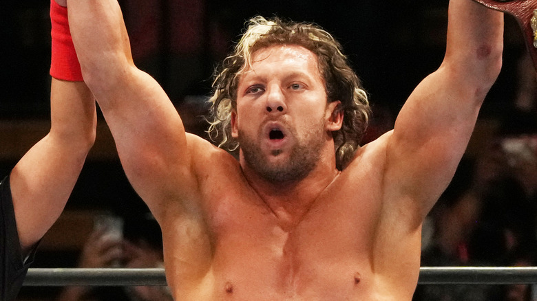 Kenny Omega celebrating