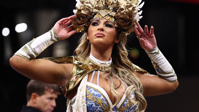 Megan Bayne wearing an elaborate headpiece