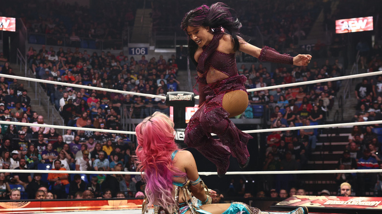 Mercedes Mone hits Mina Shirakawa with a meteora in the middle of the ring during their match at WrestleDream.