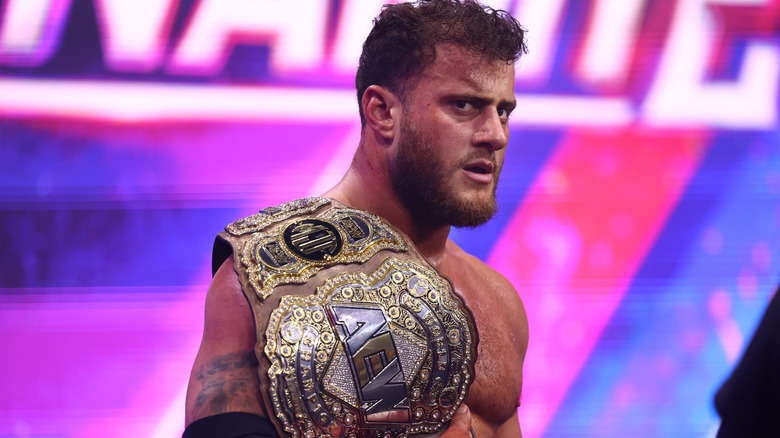 AEW World Champion MJF stands with the title on his shoulder, looking to the ring after a match, during the July 1, 2026 edition of 