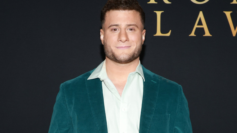MJF is wearing a green suit