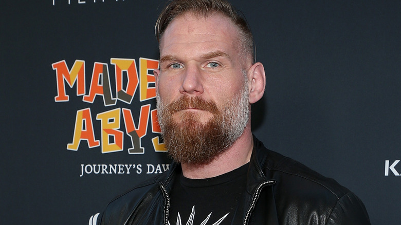 Josh Barnett wearing a leather jacket