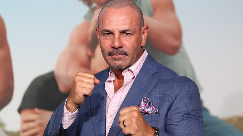 Chavo Guerrero wearing a suit