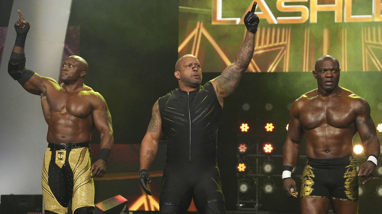Bobby Lashley, MVP, and Shelton Benjamin walking to the ring