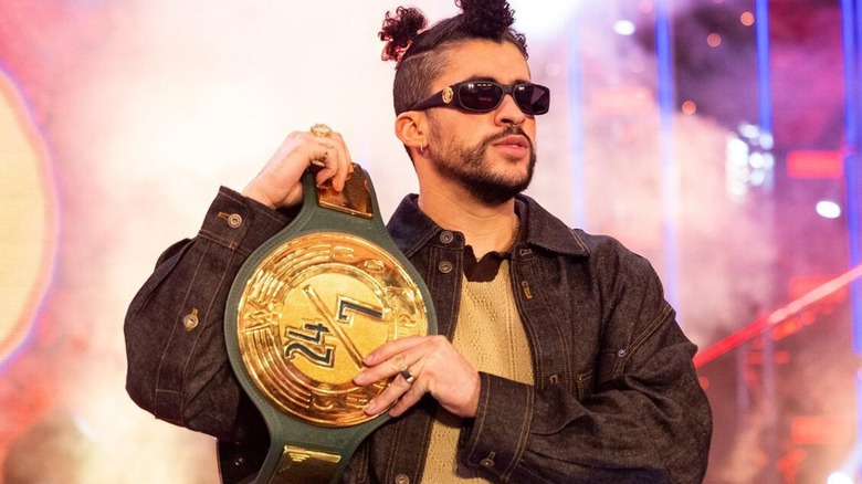 Bad Bunny holding the WWE 24/7 Championship