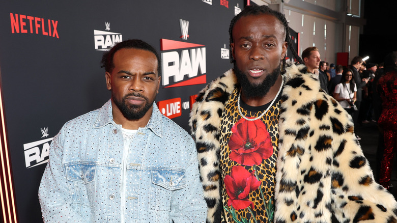 Austin Creed and Kofi staring into the camera