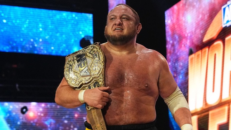 Samoa Joe with the AEW World Championship