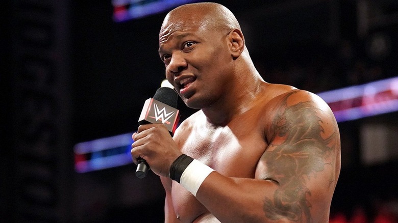 Shelton Benjamin speaking into a WWE mic