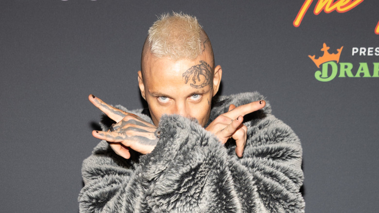 Darby Allin poses
