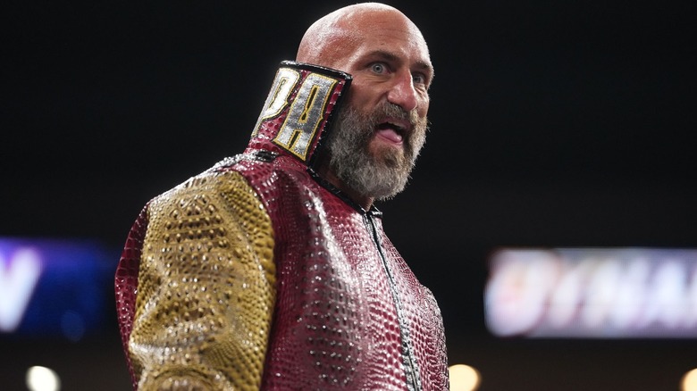 Tommaso Ciampa wearing a red ring jacket
