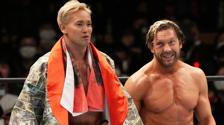 Kazuchika Okada and Kenny Omega in NJPW posing alongside one another, 2023