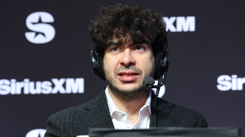 Tony Khan speaks on SiriusXM at Super Bowl LVIII on February 08, 2024 in Las Vegas, Nevada.